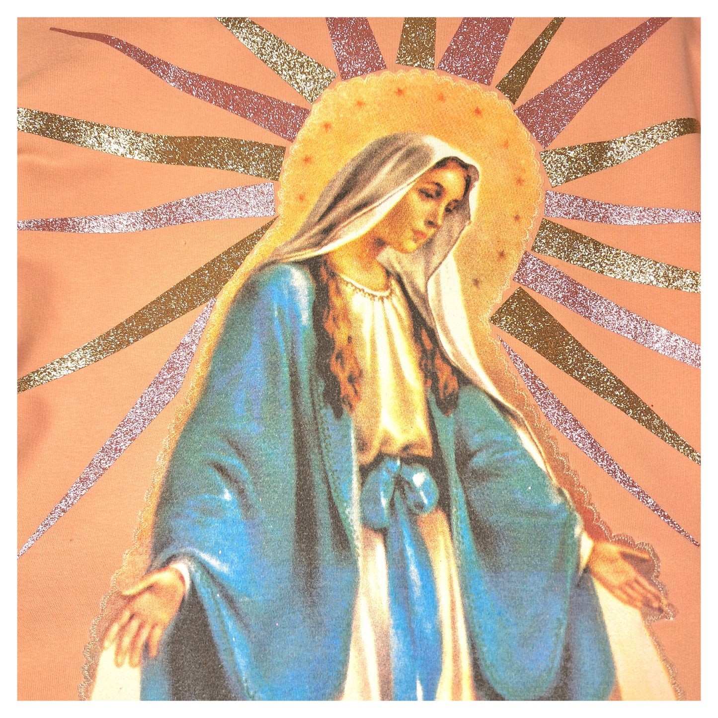 recycled, upcycled pink pullover with our lady of guadalupe pattern. glitter heat press