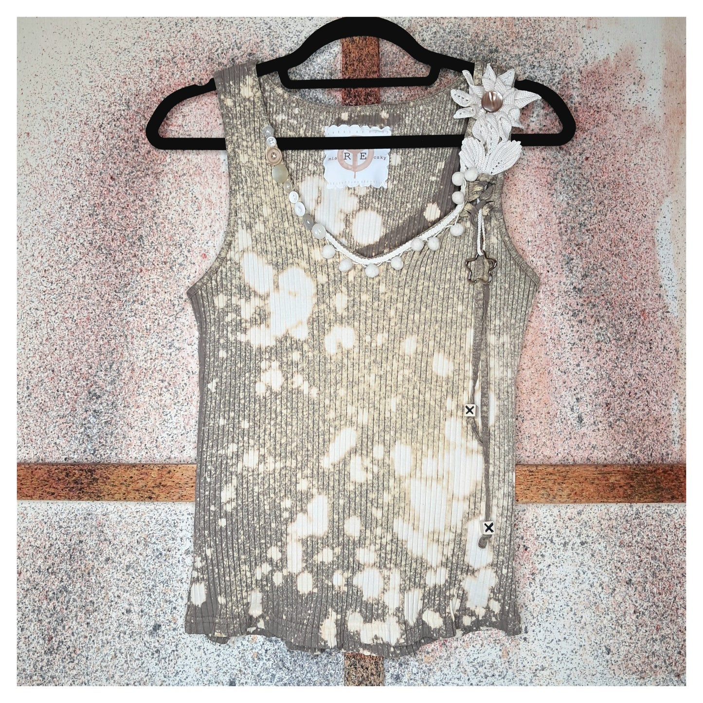 Recycled, upcycled tie-dye tank top with a crocheted white flower and vintage buttons