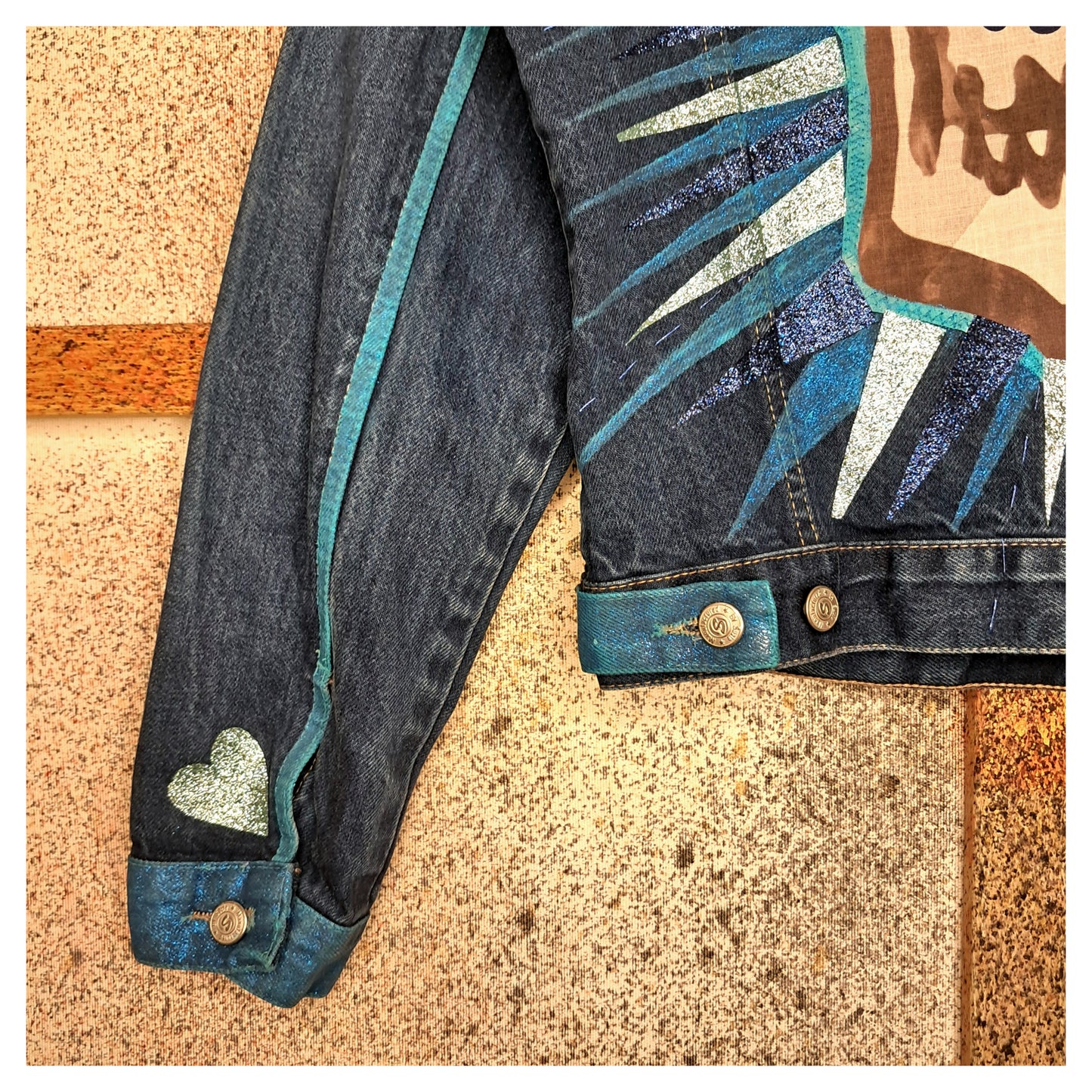 recycled, upcycled denim jacket with glitter skull on back