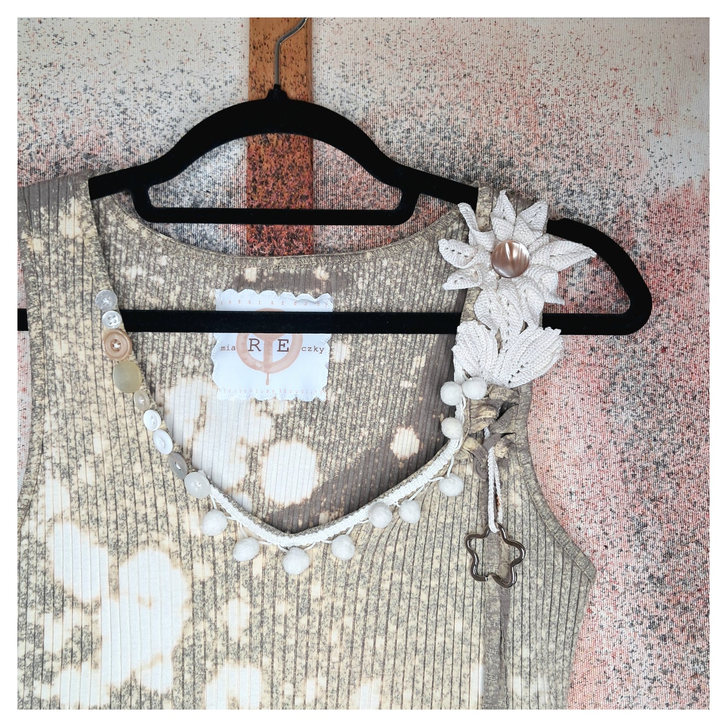 Recycled, upcycled tie-dye tank top with a crocheted white flower and vintage buttons