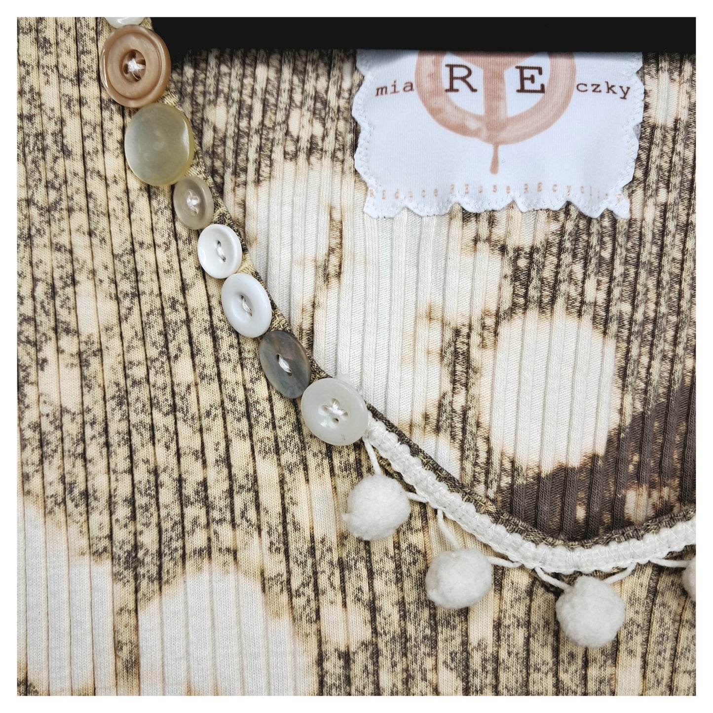 Recycled, upcycled tie-dye tank top with a crocheted white flower and vintage buttons