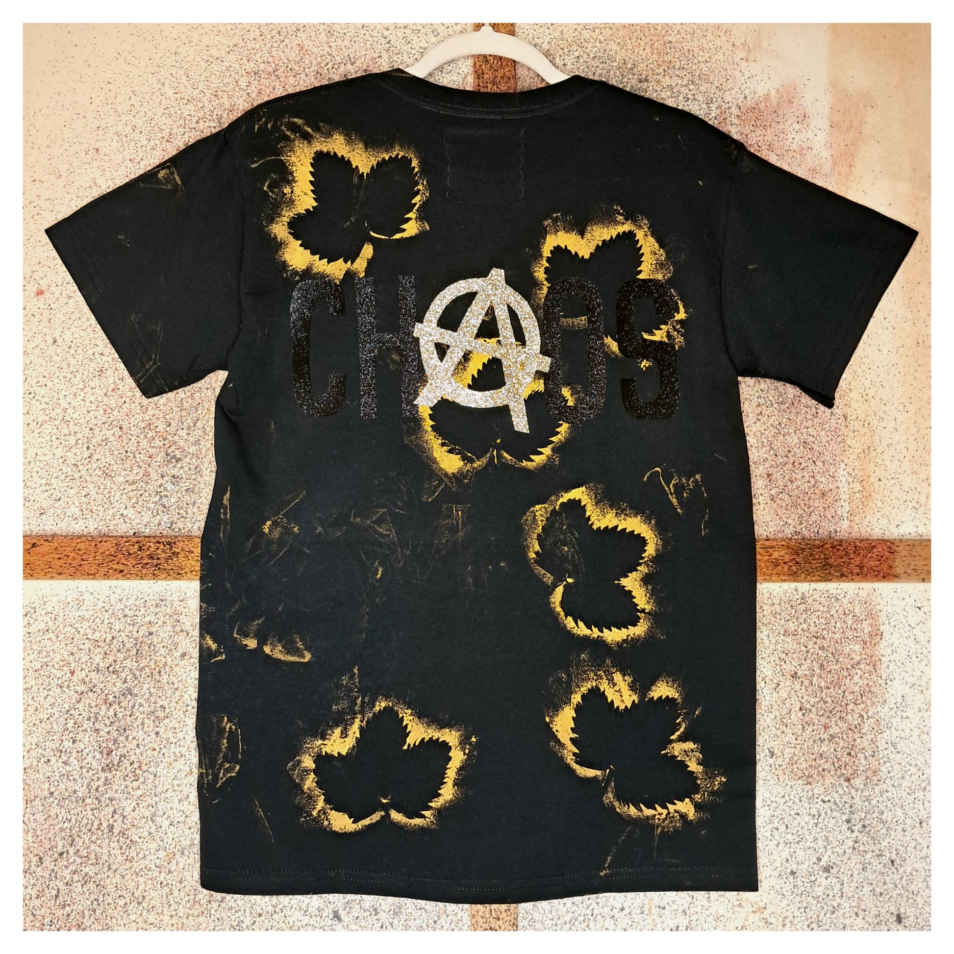 recycled, upcycledblack black t-shirt with handpainted gold leaf pattern and glitter controlled chaos heatprint