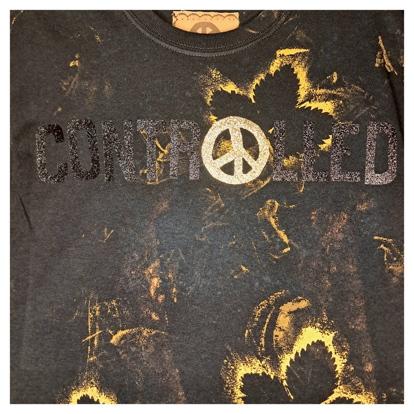 recycled, upcycledblack black t-shirt with handpainted gold leaf pattern and glitter controlled chaos heatprint