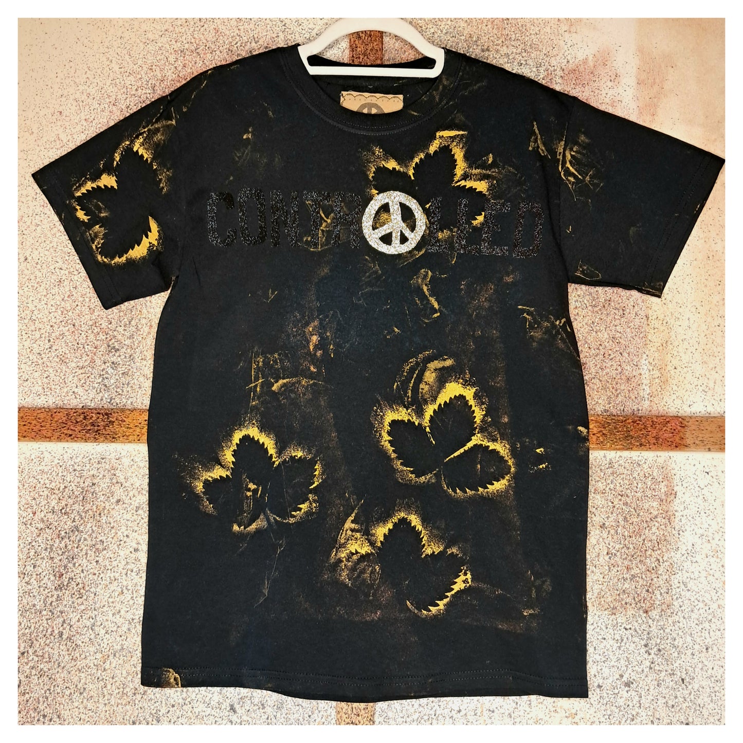 recycled, upcycledblack black t-shirt with handpainted gold leaf pattern and glitter controlled chaos heatprint