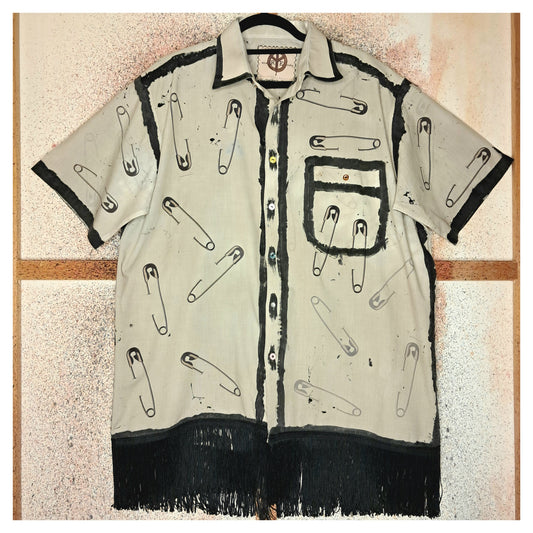Recycled, upcycled punk short-sleeve shirt with safety pin pattern. Handpainted with black fringe